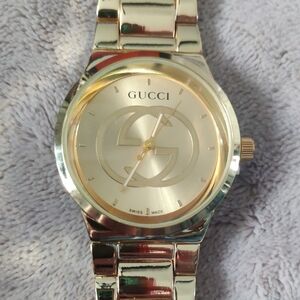Gucci Gold and Silver Watch